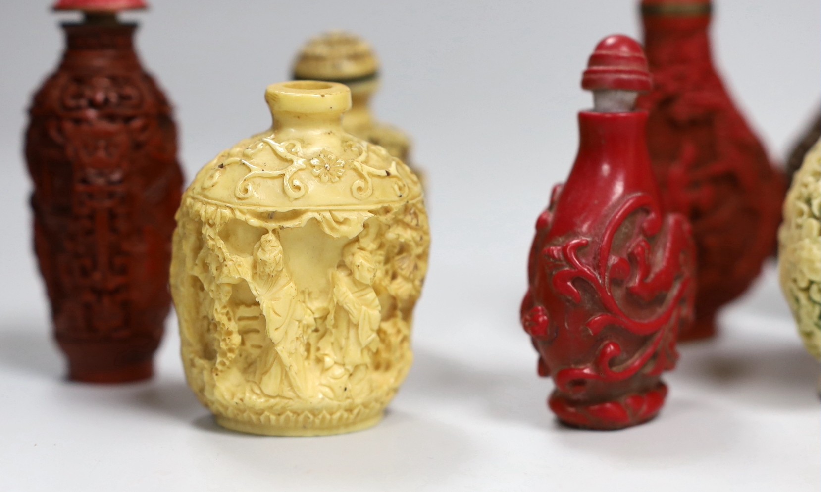 A collection of moulded resin snuff bottles